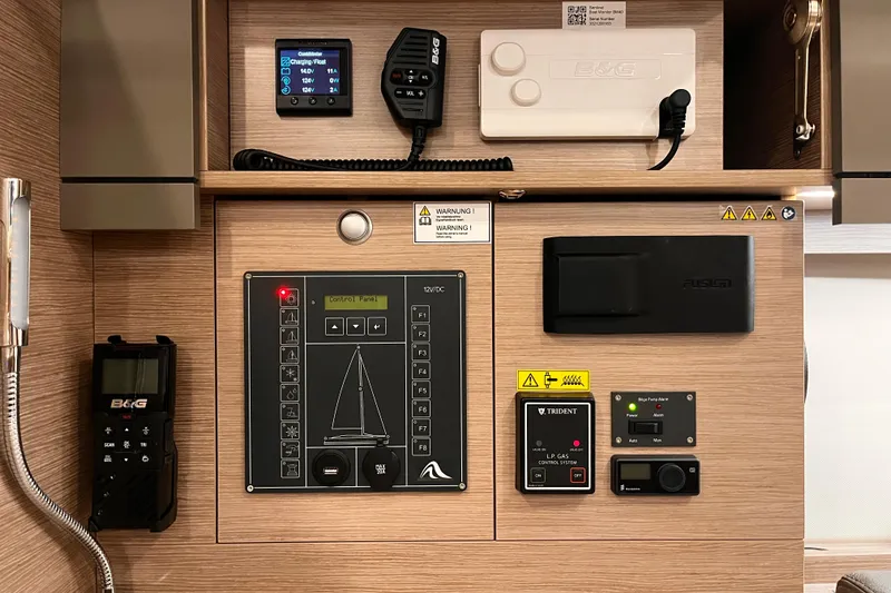 Slide: The Image of Control panel of 2023 Hanse 388 yacht with navigation and communication equipment. - 36