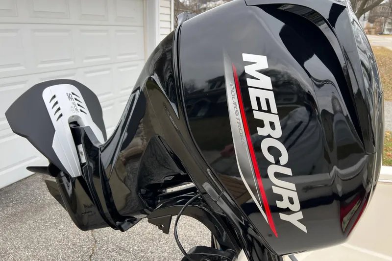 Slide: The Image of Mercury outboard motor on 2023 Boston Whaler 130 Super Sport boat. - 8