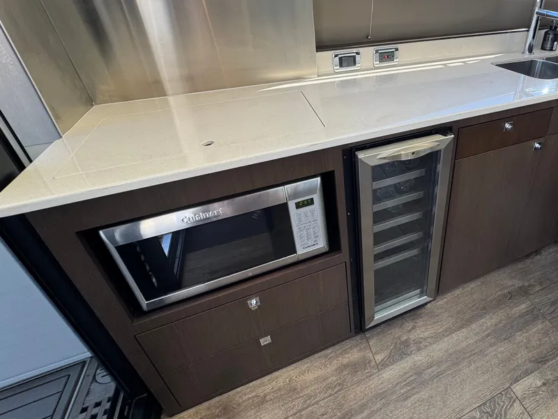 Slide: The Image of Interior of a 2020 Carver C52 yacht with modern design. - 9