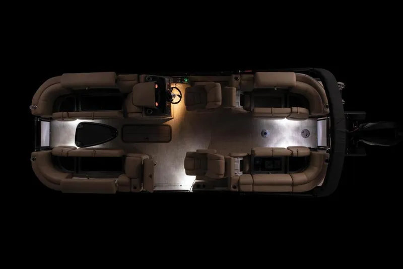 Slide: The Image of Aerial view of 2022 Regency 230 DL3 pontoon boat with interior lighting. - 17