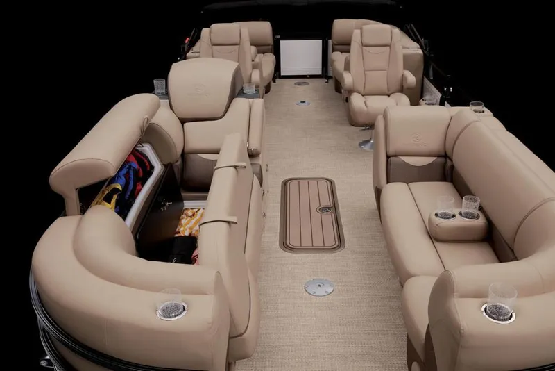 Slide: The Image of Interior of 2022 Regency 230 DL3 pontoon boat with luxurious seating. - 22