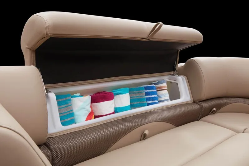 Slide: The Image of Regency 230 DL3 2022 seat storage with colorful towels. - 26