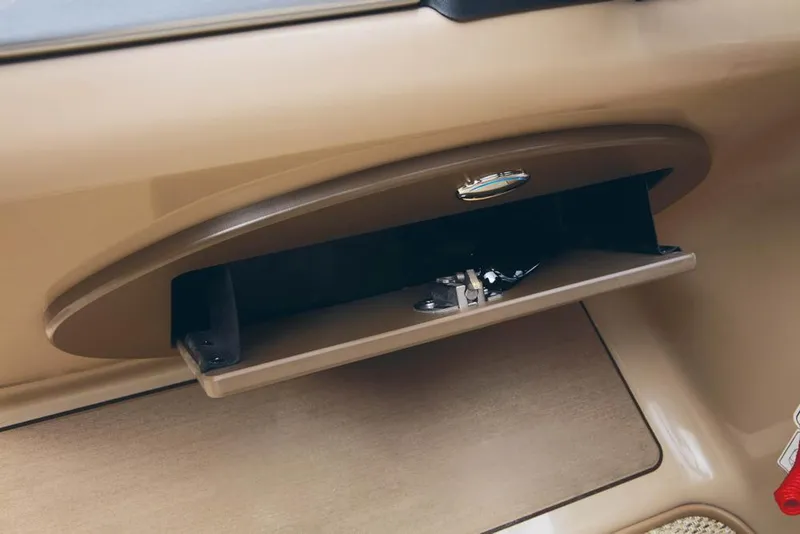Slide: The Image of Open glove compartment of a 2022 Regency 230 DL3. - 38