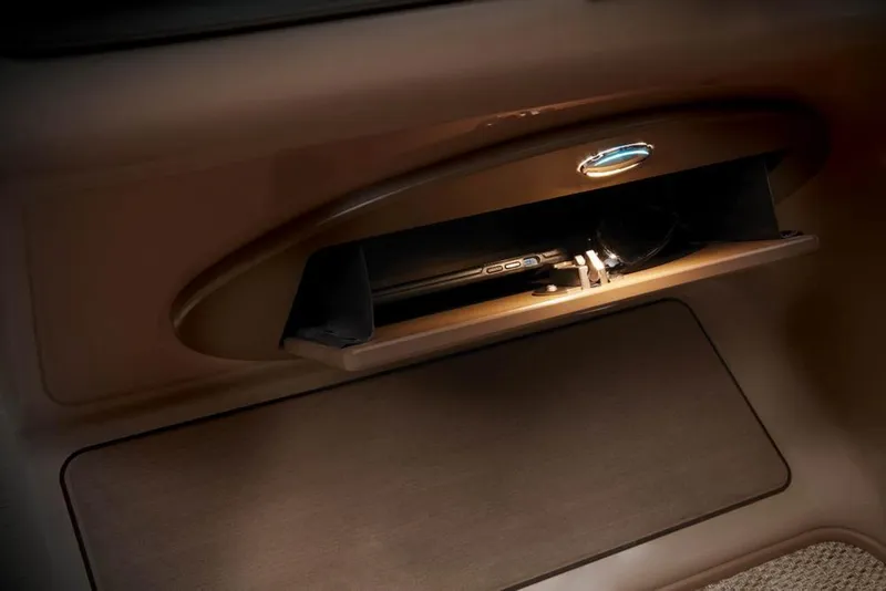 Slide: The Image of Regency 230 DL3 2022 glove compartment with interior lighting. - 39