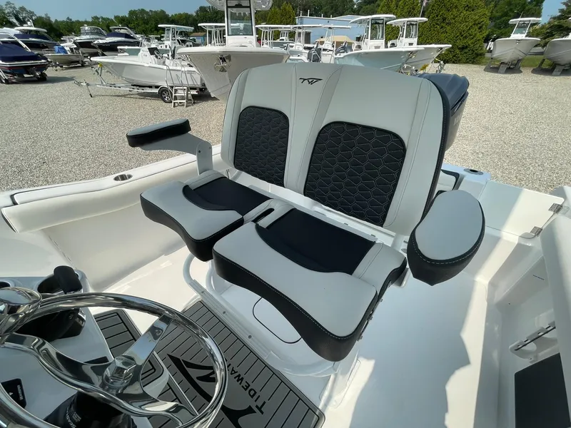 Slide: The Image of 2025 Tidewater 232 CC Adventure boat seating with modern design and comfortable upholstery. - 27