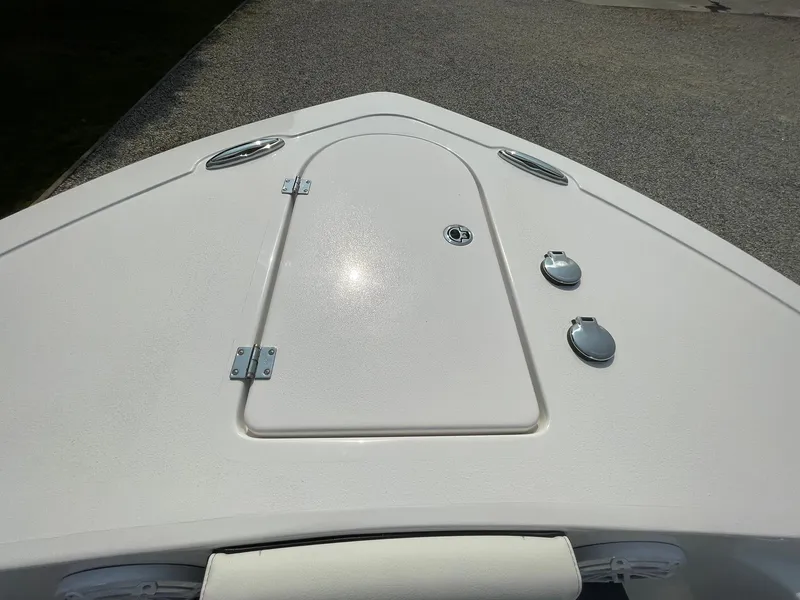 Slide: The Image of 2025 Tidewater 232 CC Adventure boat deck with hatch and fittings. - 3