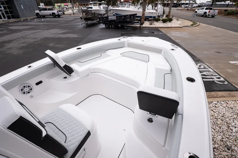 Slide: The Image of 2026 Blackfin 242 HB boat interior with white seating and modern design. - 18