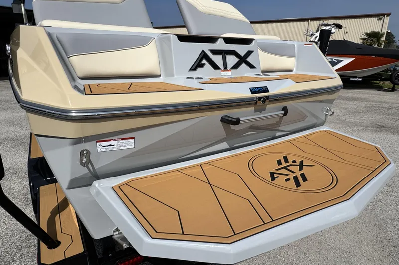 Slide: The Image of 2026 ATX Surf Boats 22 Type-S rear view with logo and swim platform. - 9