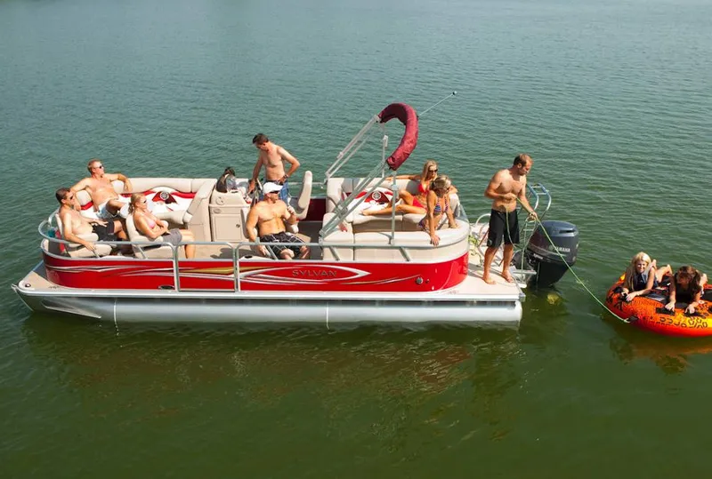 Slide: The Image of Manufacturer Provided Image: 2013 Sylvan Mirage Cruise 8522 LZ pontoon boat with people enjoying water activities. - 3