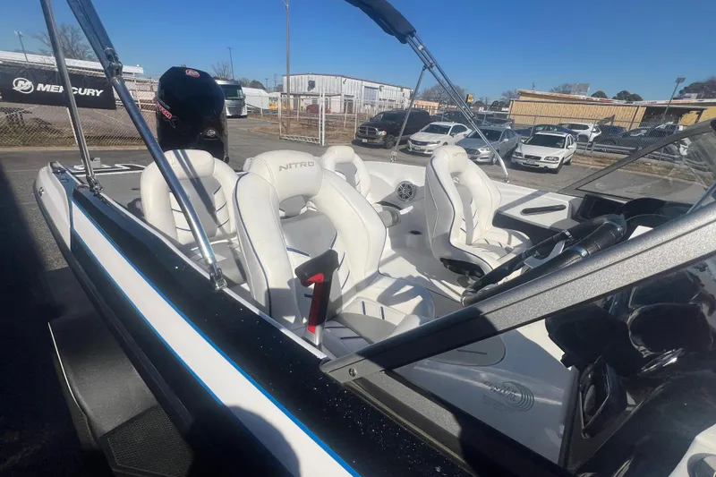 Slide: The Image of 2022 Nitro Z19 Sport boat with white interior and sleek design. - 17