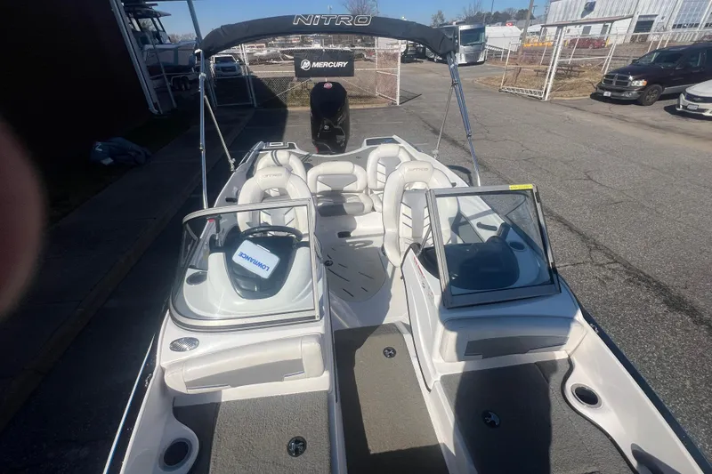 Slide: The Image of 2022 Nitro Z19 Sport boat with Mercury engine, featuring spacious seating and modern design. - 32