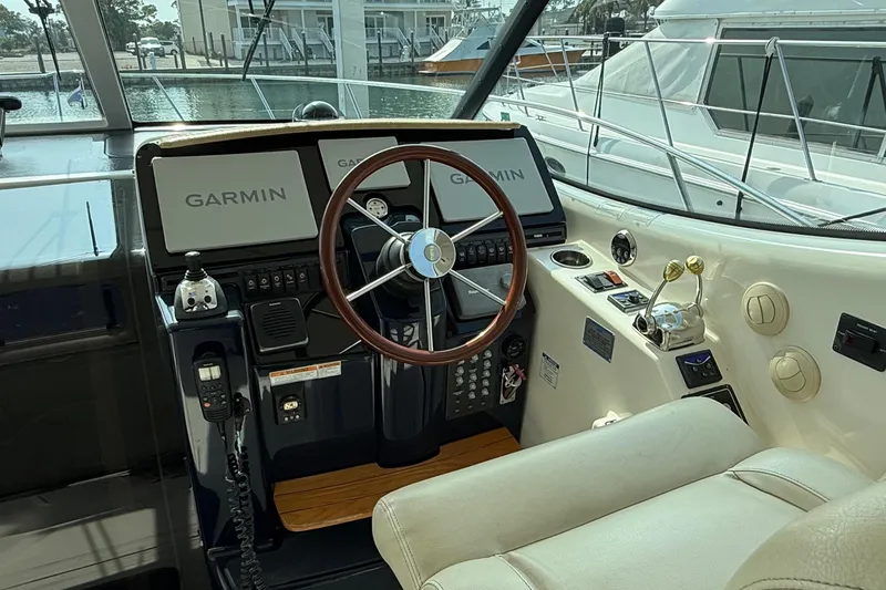 Slide: The Image of 2007 Tiara Yachts 3900 Sovran helm with Garmin navigation system and luxurious seating. - 13