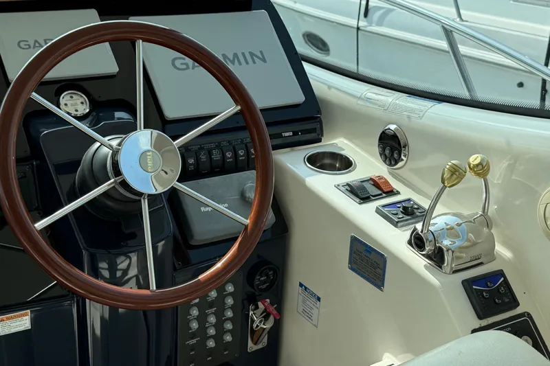 Slide: The Image of Helm of 2007 Tiara Yachts 3900 Sovran with Garmin navigation and dual throttle controls. - 14