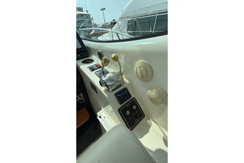 Slide: The Image of 2007 Tiara Yachts 3900 Sovran helm controls and dashboard details. - 15