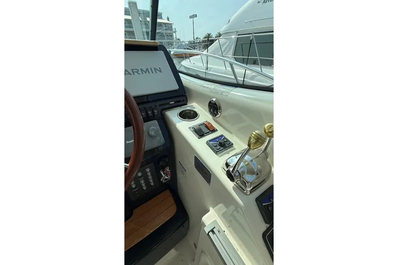 Slide: The Image of 2007 Tiara Yachts 3900 Sovran helm with Garmin navigation system and controls. - 16