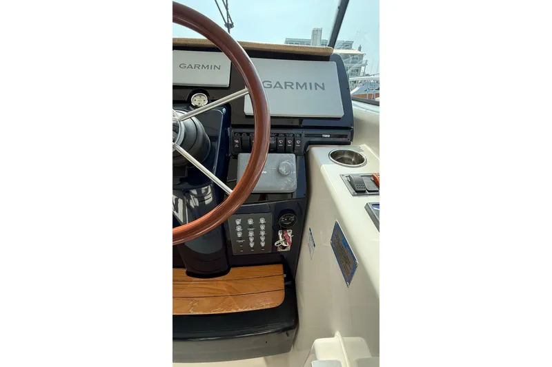 Slide: The Image of Helm of 2007 Tiara Yachts 3900 Sovran with Garmin navigation system. - 18