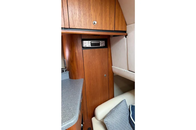 Slide: The Image of 2007 Tiara Yachts 3900 Sovran interior with wood cabinetry and modern amenities. - 41