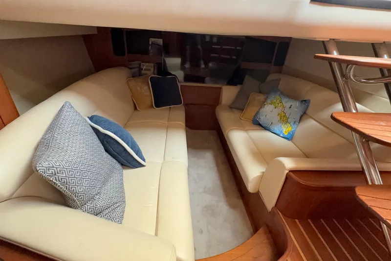 Slide: The Image of Luxurious interior of 2007 Tiara Yachts 3900 Sovran with plush seating and decorative pillows. - 56