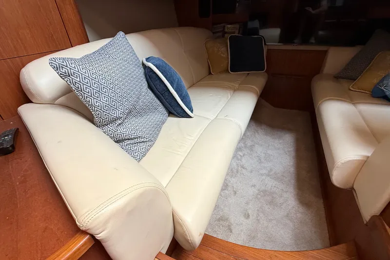 Slide: The Image of Luxurious interior of 2007 Tiara Yachts 3900 Sovran with plush seating and decorative pillows. - 57