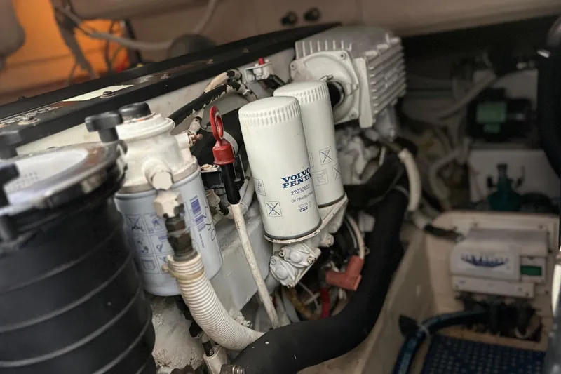 Slide: The Image of Engine compartment of a 2007 Tiara Yachts 3900 Sovran, featuring Volvo Penta components. - 61