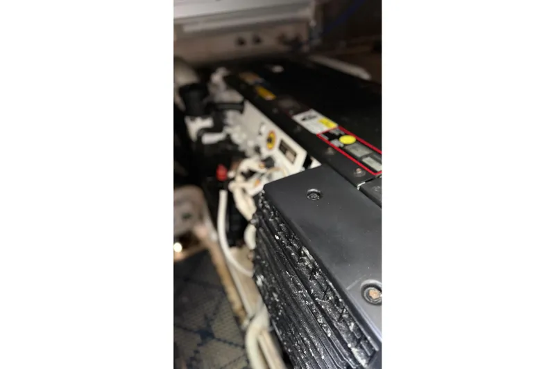 Slide: The Image of Engine compartment of a 2007 Tiara Yachts 3900 Sovran, showcasing mechanical components. - 62