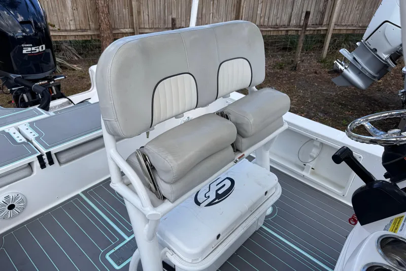 Slide: The Image of 2019 Sea Fox 240 Viper boat interior with seating and Yamaha 250 engine. - 15
