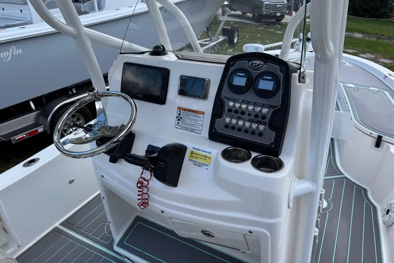 Slide: The Image of 2019 Sea Fox 240 Viper boat console with steering wheel and control panel. - 16