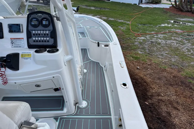 Slide: The Image of 2019 Sea Fox 240 Viper boat interior with control panel and seating area. - 17