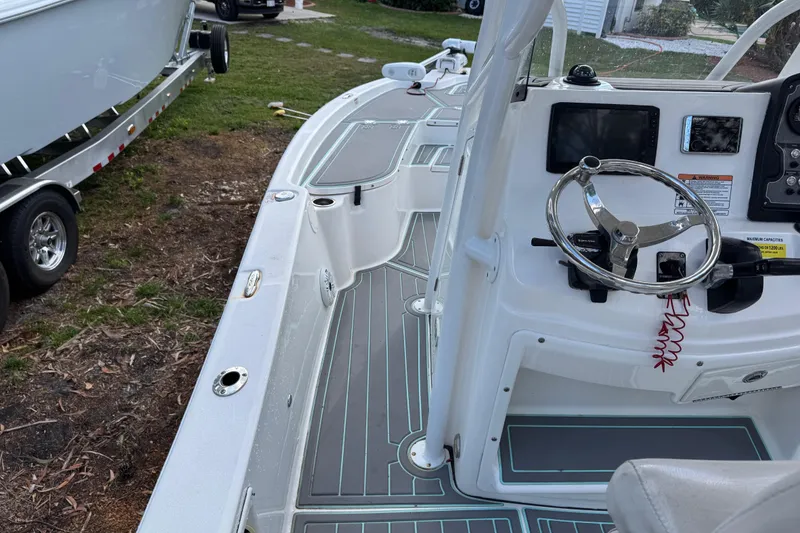 Slide: The Image of 2019 Sea Fox 240 Viper boat interior with steering wheel and control panel. - 19
