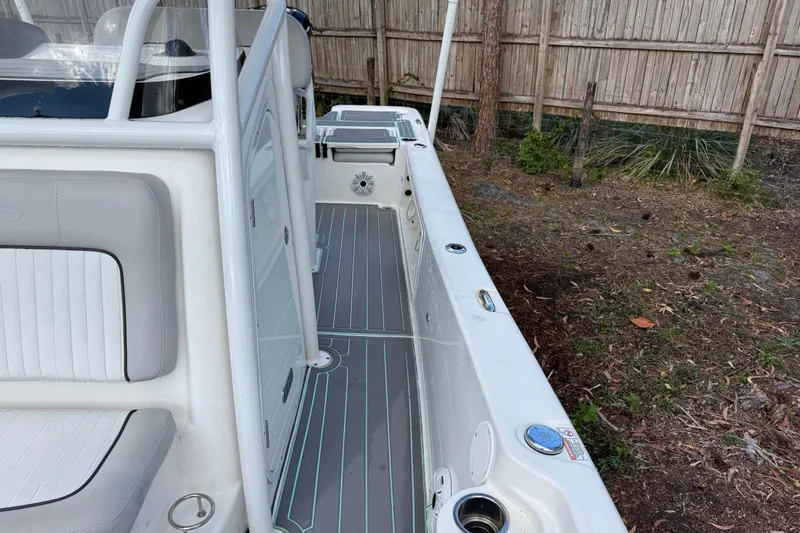 Slide: The Image of 2019 Sea Fox 240 Viper boat interior with seating and deck details. - 21