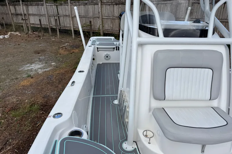Slide: The Image of 2019 Sea Fox 240 Viper boat interior with seating and deck details. - 22