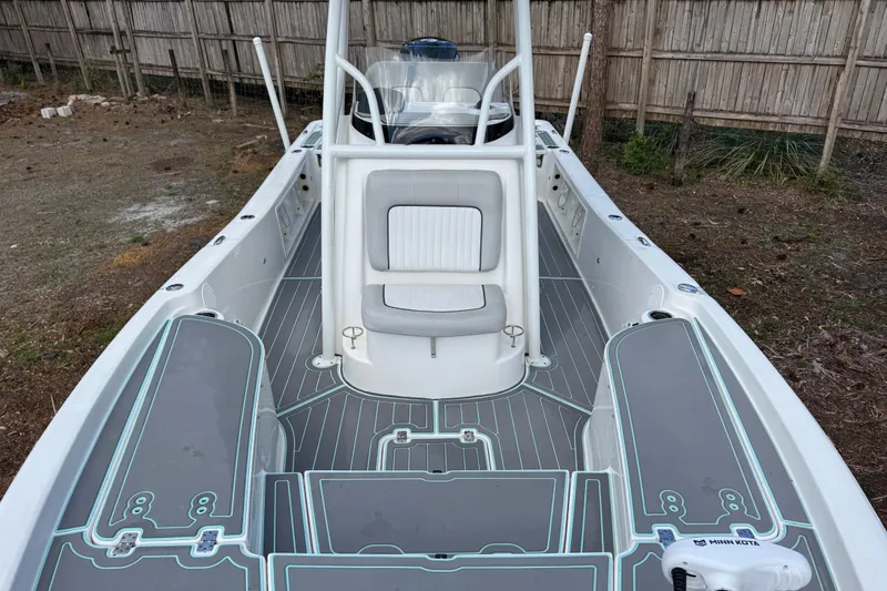 Slide: The Image of 2019 Sea Fox 240 Viper boat interior with seating and deck details. - 23