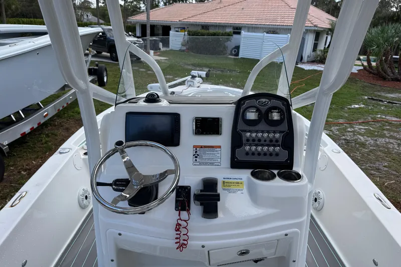 Slide: The Image of 2019 Sea Fox 240 Viper boat console with steering wheel and control panel. - 24
