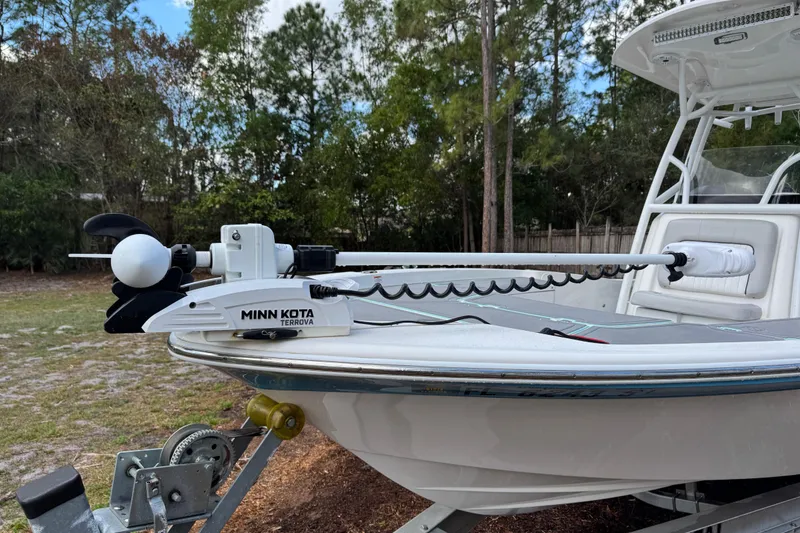 Slide: The Image of 2019 Sea Fox 240 Viper boat with Minn Kota Terrova trolling motor, parked outdoors. - 3