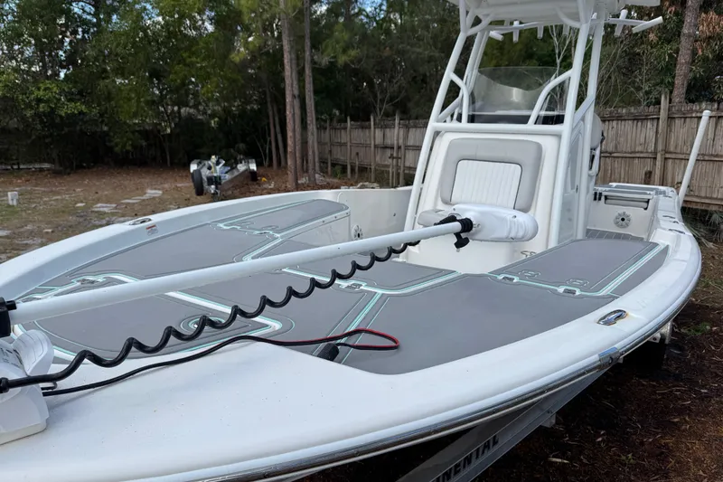 Slide: The Image of 2019 Sea Fox 240 Viper boat with trolling motor, parked outdoors. - 4