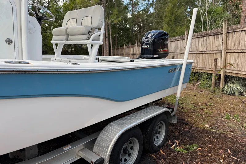 Slide: The Image of 2019 Sea Fox 240 Viper boat on trailer with Yamaha engine, parked outdoors. - 5