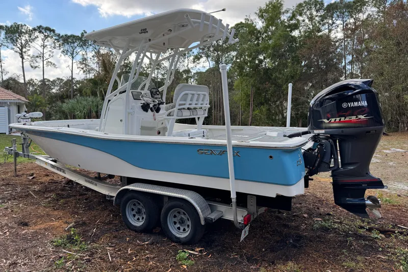 Slide: The Image of 2019 Sea Fox 240 Viper boat on trailer with Yamaha VMAX engine, parked outdoors. - 6