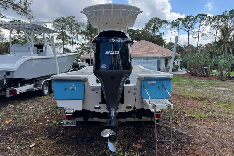 Slide: The Image of 2019 Sea Fox 240 Viper boat with powerful 250 engine, parked outdoors. - 8