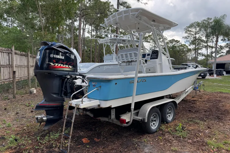 Slide: The Image of 2019 Sea Fox 240 Viper boat with Yamaha engine on trailer, parked outdoors. - 9