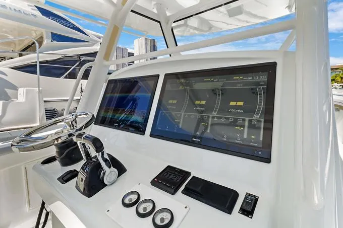 Slide: The Image of 2020 Yellowfin 39 Center Console dashboard with advanced navigation displays. - 3