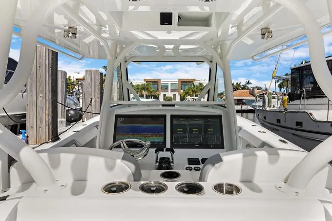 Slide: The Image of 2020 Yellowfin 39 Center Console boat cockpit with advanced navigation displays. - 4