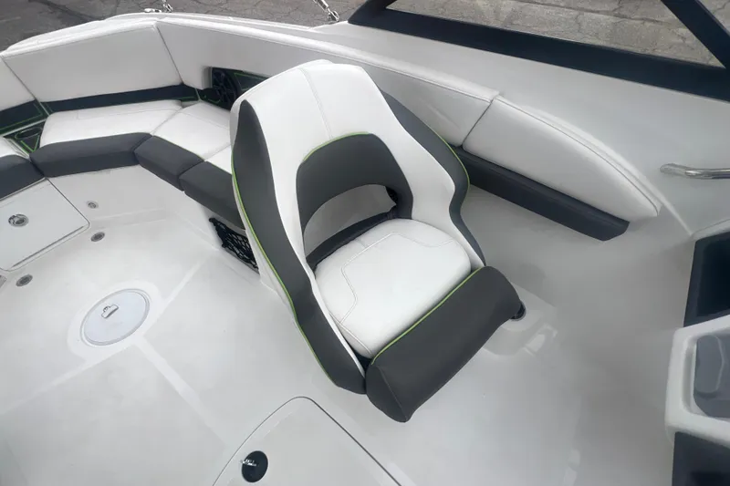 Slide: The Image of 2024 Tahoe 210 S boat interior with sleek seating and modern design. - 24