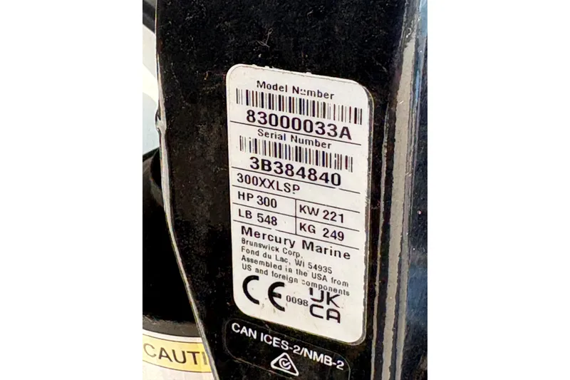 Slide: The Image of Mercury Marine engine label on 2021 Cobia 237 Center Console, showing model and serial numbers. - 20