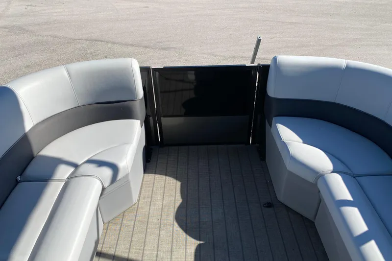 Slide: The Image of 2024 Bentley Pontoons Legacy Swingback interior seating with modern design and comfortable upholstery. - 11