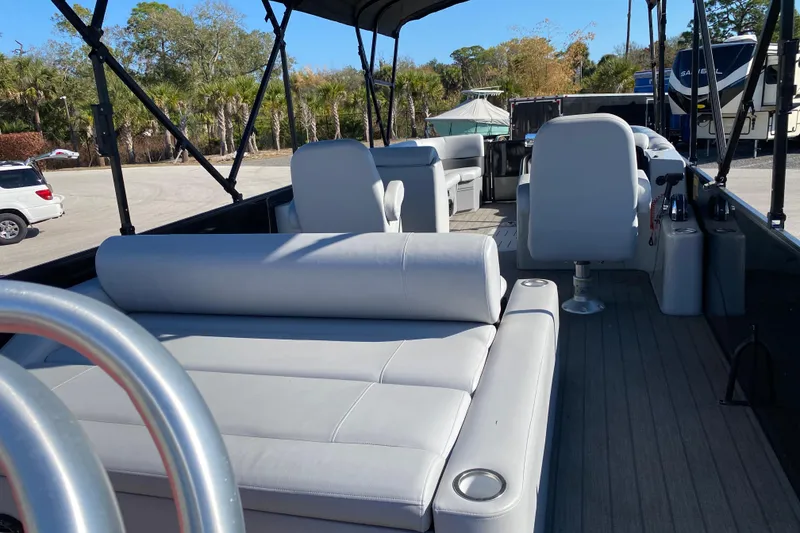 Slide: The Image of 2024 Bentley Pontoons Legacy Swingback with spacious seating and modern design. - 5