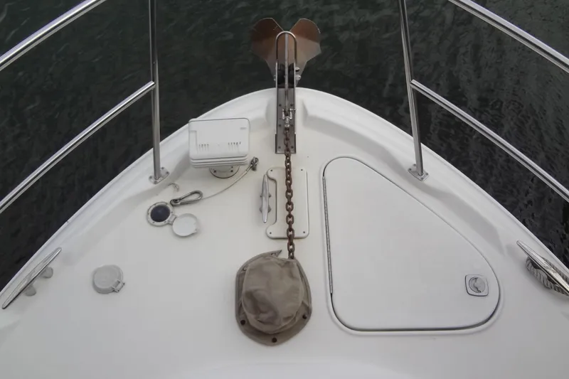 Slide: The Image of Bow of 2001 Sea Ray 380 Sundancer with anchor and deck fittings. - 10