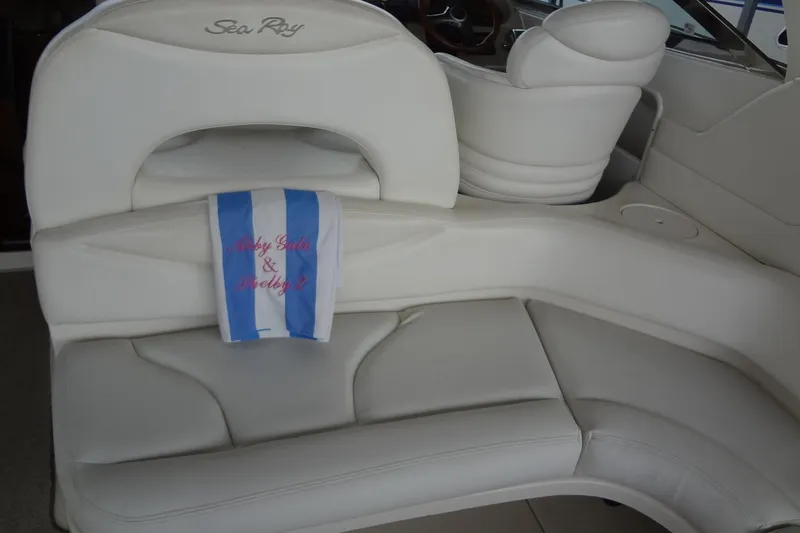 Slide: The Image of White leather seating on 2001 Sea Ray 380 Sundancer boat interior. - 18