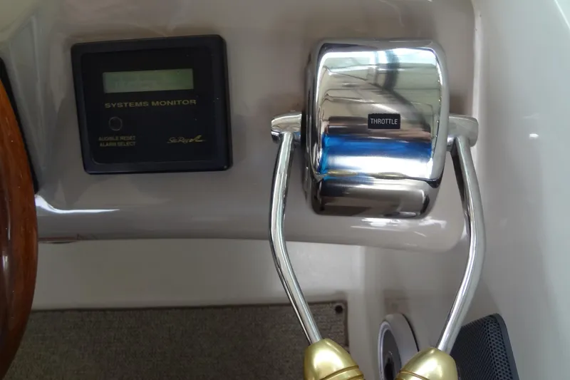 Slide: The Image of Throttle control and systems monitor on 2001 Sea Ray 380 Sundancer boat. - 28