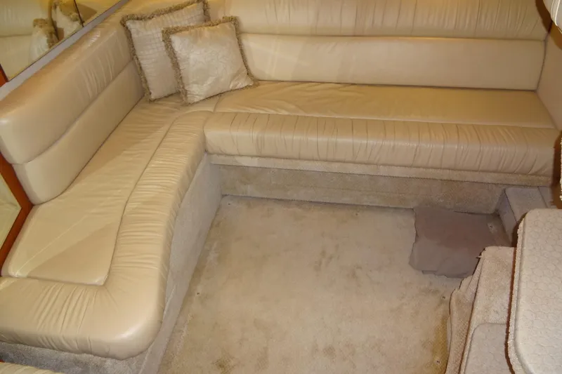 Slide: The Image of Luxurious beige leather seating in 2001 Sea Ray 380 Sundancer yacht interior. - 36