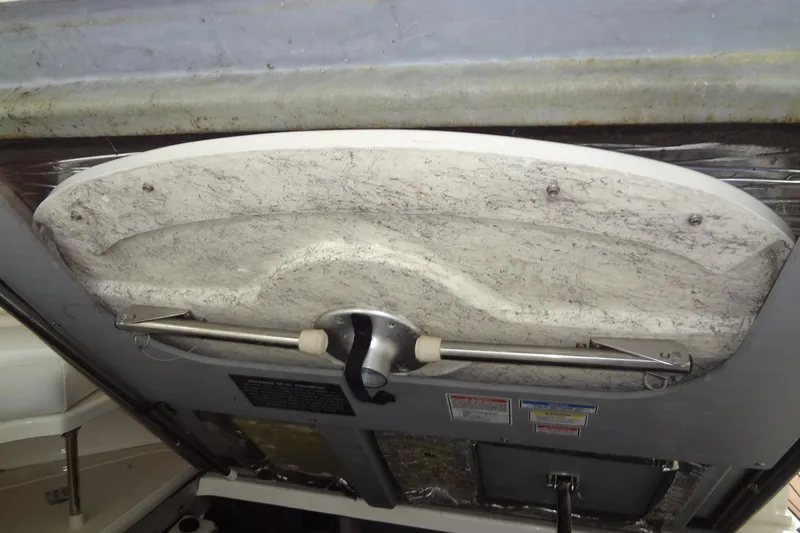 Slide: The Image of Hatch mechanism of 2001 Sea Ray 380 Sundancer boat, showing interior details. - 70